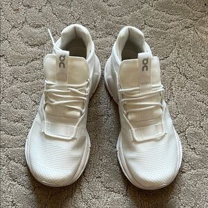 On Running All-White Athletic Shoes